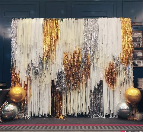 Our Fringe Backdrop Wall is the perfect way to create a stunning and elegant display. . Fringe wall backdrop